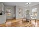 Bright breakfast nook with hardwood floors and built-in cabinetry at 17929 Pages Pond Ct, Davidson, NC 28036