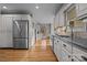 Kitchen with stainless steel appliances and granite countertops at 17929 Pages Pond Ct, Davidson, NC 28036