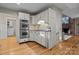 Bright kitchen features stainless steel appliances and white cabinetry at 17929 Pages Pond Ct, Davidson, NC 28036