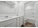 Clean bathroom with double vanity and view of tub and shower at 311 Bezelle Ave, York, SC 29745