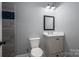 Clean bathroom with a vanity, toilet, and tiled shower at 329 Wintergreen Ct, Kings Mountain, NC 28086