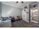 bedroom with twin bed, ceiling fan, and en-suite bathroom at 329 Wintergreen Ct, Kings Mountain, NC 28086