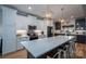 Large kitchen island with white and gray cabinets at 329 Wintergreen Ct, Kings Mountain, NC 28086