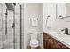 Bathroom with white vanity, shower, and toilet at 6920 Wyndbend Ln, Mint Hill, NC 28227