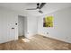 Bright bedroom with ceiling fan, window, and closet at 6920 Wyndbend Ln, Mint Hill, NC 28227