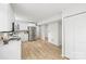 Modern white kitchen with stainless steel appliances at 6920 Wyndbend Ln, Mint Hill, NC 28227