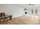 Living room featuring a fireplace and French doors leading outside at 6920 Wyndbend Ln, Mint Hill, NC 28227