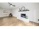 Living room with a fireplace and hardwood floors at 6920 Wyndbend Ln, Mint Hill, NC 28227