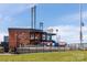 Exterior view of Atrium Health Ballpark with brick facade and steel light towers at 9913 Manor Vista Trl, Kannapolis, NC 28027