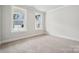 Neutral bedroom with carpet and windows at 9913 Manor Vista Trl, Kannapolis, NC 28027