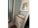 Small bathroom sink with granite counter and storage at 102 Elm St # 94, New London, NC 28127