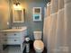 Renovated bathroom with modern vanity, fixtures, and a clean, bright atmosphere at 102 Elm St # 94, New London, NC 28127