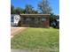 Charming exterior of home with a covered front porch and well-maintained lawn at 102 Elm St # 94, New London, NC 28127