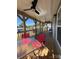 Comfortable covered front porch with ceiling fans and outdoor seating area at 102 Elm St # 94, New London, NC 28127