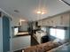 Efficient kitchen with modern appliances and a cozy dining area at 102 Elm St # 94, New London, NC 28127