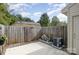 Small, private backyard with patio and storage shed at 1201 Green Oaks Ln # G, Charlotte, NC 28205