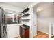 Kitchen with dark wood cabinets, granite counters, and stainless steel appliances at 1201 Green Oaks Ln # G, Charlotte, NC 28205