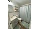 Modern bathroom with gray vanity and shower at 1520 Yellowstone Ct, Gastonia, NC 28054