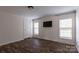 Simple bedroom with hardwood floors and ample natural light at 1520 Yellowstone Ct, Gastonia, NC 28054