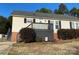 Ranch style home with deck and landscaped yard at 1520 Yellowstone Ct, Gastonia, NC 28054