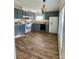 Spacious kitchen with gray cabinets and new wood-look vinyl flooring at 1520 Yellowstone Ct, Gastonia, NC 28054