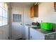 Laundry room with washer, dryer, and storage cabinets at 1520 Yellowstone Ct, Gastonia, NC 28054