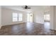 Spacious living area featuring hardwood floors and access to deck at 1520 Yellowstone Ct, Gastonia, NC 28054