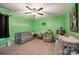 Bright bedroom with green walls, and a ceiling fan at 3020 Pinehills Way, Mount Holly, NC 28120