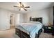 Comfortable bedroom featuring carpet floors, a ceiling fan, and neutral paint at 3020 Pinehills Way, Mount Holly, NC 28120