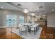 Spacious dining area with hardwood floors and large windows at 520 E Martin Luther King Blvd # 1204, Charlotte, NC 28202