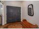 Entryway with hardwood floors, bench, and mirror at 520 E Martin Luther King Blvd # 1204, Charlotte, NC 28202