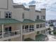 Upscale building exterior with balconies and a metal roof at 520 E Martin Luther King Blvd # 1204, Charlotte, NC 28202