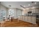 Modern kitchen with breakfast nook and hardwood floors at 520 E Martin Luther King Blvd # 1204, Charlotte, NC 28202