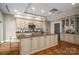 Gourmet kitchen featuring a large island and hardwood floors at 520 E Martin Luther King Blvd # 1204, Charlotte, NC 28202