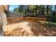 Back deck with wooden railings and green space views at 6001 Long Pine Dr, Charlotte, NC 28227