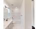 Bathroom featuring white marbled floors, grey vanity, updated fixtures, and shower-tub combo at 10132 Whitaker Pointe Dr, Huntersville, NC 28078