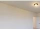 Neutral bedroom featuring a light fixture, a door, and natural light from windows at 10132 Whitaker Pointe Dr, Huntersville, NC 28078