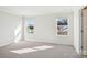 Well-lit bedroom with carpeted floor and two windows at 1284 31St Ne St, Conover, NC 28613