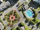 Aerial view showing community pool and landscaped garden at 14307 San Paolo Ln # 5102, Charlotte, NC 28277