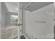 Bathroom with a shower stall and a door to bedroom at 14307 San Paolo Ln # 5102, Charlotte, NC 28277