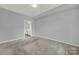 Spacious bedroom with neutral walls and carpet at 14307 San Paolo Ln # 5102, Charlotte, NC 28277