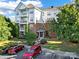 Brick building exterior with landscaping and parking at 14307 San Paolo Ln # 5102, Charlotte, NC 28277