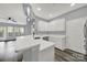 Modern kitchen with white cabinets, quartz countertops, and stainless steel appliances at 14307 San Paolo Ln # 5102, Charlotte, NC 28277