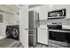 Laundry room with washer, dryer, and refrigerator at 14307 San Paolo Ln # 5102, Charlotte, NC 28277