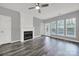 Living room with fireplace and hardwood floors at 14307 San Paolo Ln # 5102, Charlotte, NC 28277