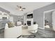 Virtually staged living room with fireplace, modern furniture, and an open floor plan at 14307 San Paolo Ln # 5102, Charlotte, NC 28277
