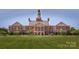 Expansive view of a large academic building, showcasing its symmetrical design and green lawns at 9921 Manor Vista Trl, Kannapolis, NC 28027