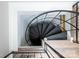 Overhead view of the unique black metal spiral staircase at 110 Mimosa Rd, Statesville, NC 28677