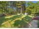 Large backyard with shed and privacy fence at 364 Chuckwood Rd, Mooresville, NC 28117