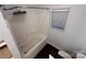 Updated bathroom with white subway tile surround, and modern shower head and controls at 131 Glendale Se Ave, Concord, NC 28025